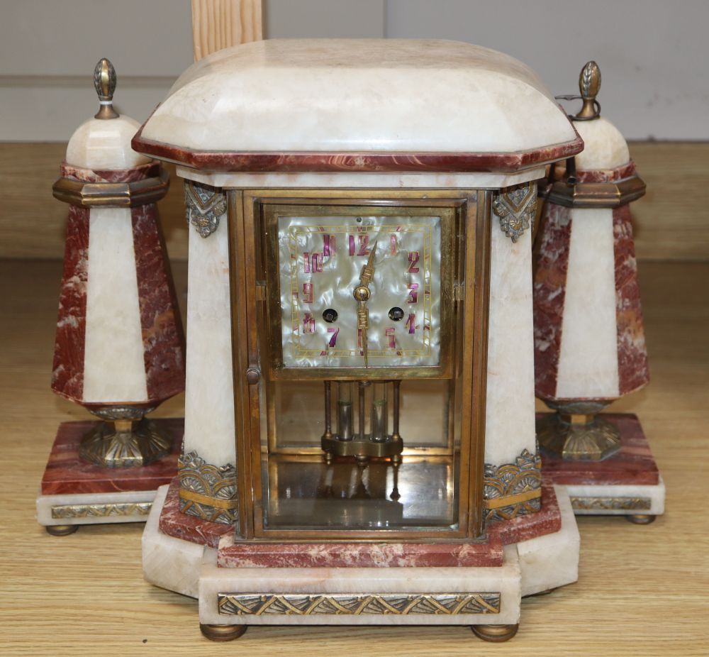 An Art Deco mixed marble ormolu clock garniture, clock height 32cm
